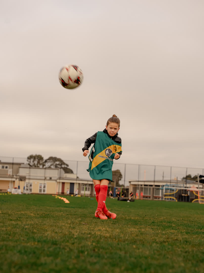 A player juggling the ball in the air