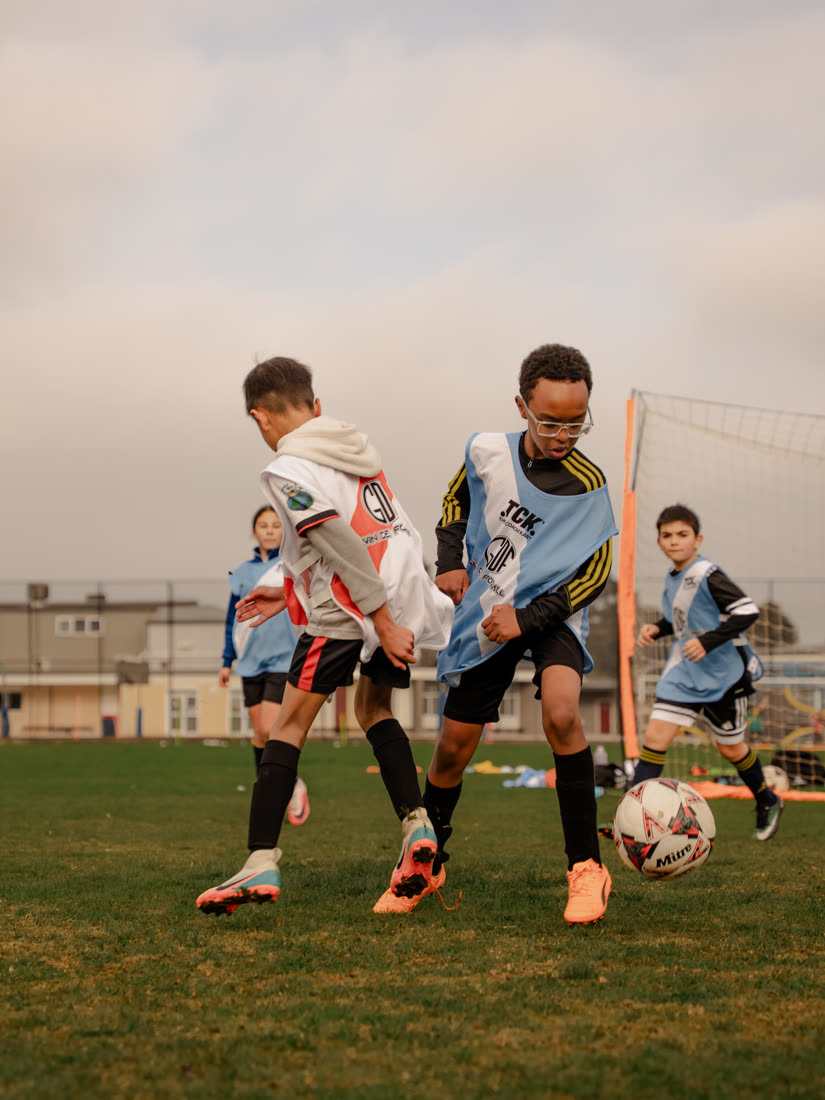 Two GDF players competing for the ball